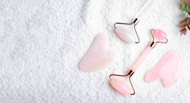 istock Rose Quartz Roller and Gua Sha tool, Facial Lifting Massage Treatment 1496786115