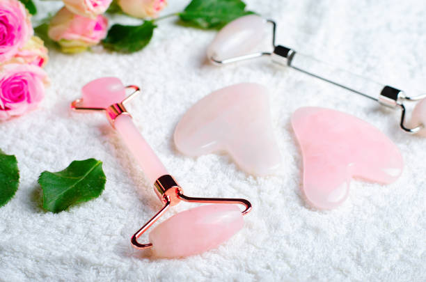 istock Rose Quartz Roller and Gua Sha tool, Facial Lifting Massage Treatment 1496786496