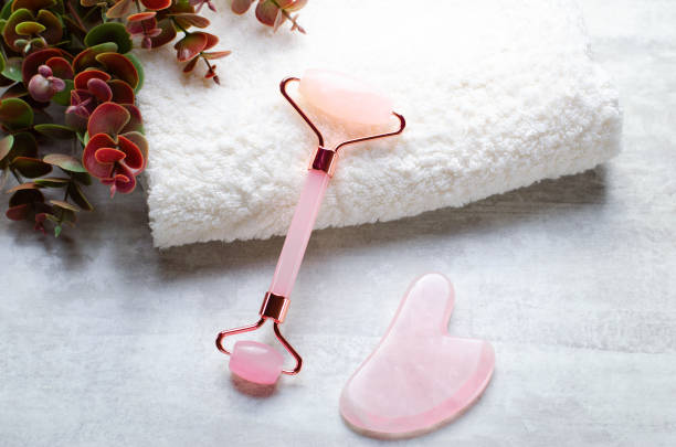 istock Rose Quartz Roller and Gua Sha tool, Facial Lifting Massage Treatment 1496786710