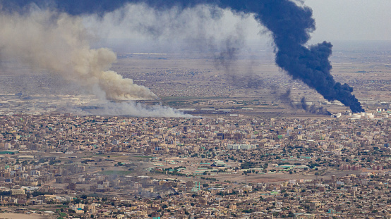 ‏An aerial photo dated June 7, 2023 showing fires of fuel and ammunition warehouses in the Jabra area south of the Sudanese capital Khartoum