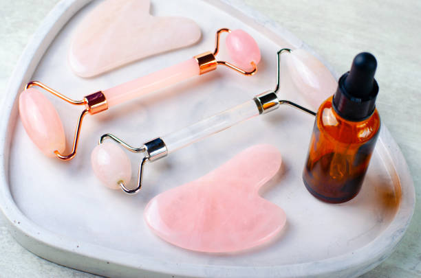 istock Rose Quartz Roller and Gua Sha tool, Facial Lifting Massage Treatment 1496786748