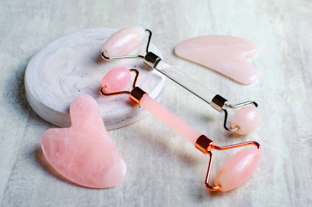 istock Rose Quartz Roller and Gua Sha tool, Facial Lifting Massage Treatment 1496786906
