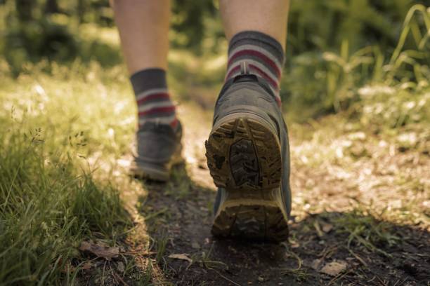 istock Mens footsteps on the trail 1496786944