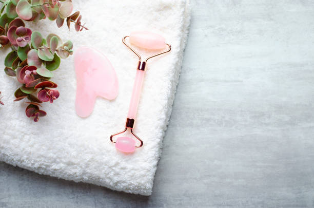 istock Rose Quartz Roller and Gua Sha tool, Facial Lifting Massage Treatment 1496787687