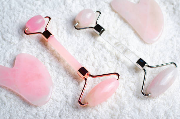 istock Rose Quartz Roller and Gua Sha tool, Facial Lifting Massage Treatment 1496787754