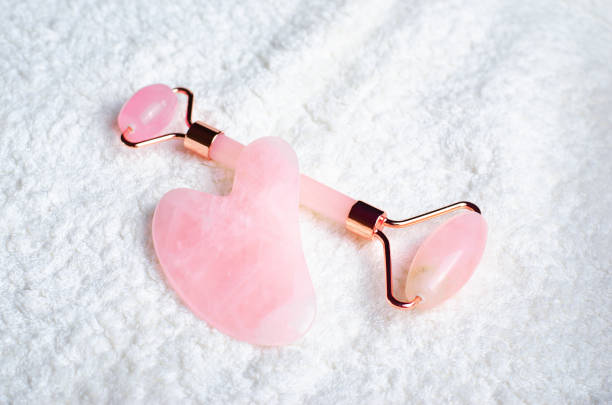 istock Rose Quartz Roller and Gua Sha tool, Facial Lifting Massage Treatment 1496787824