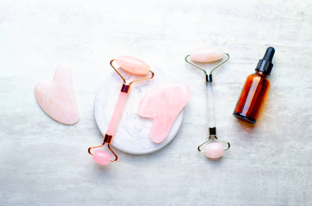 istock Rose Quartz Roller and Gua Sha tool, Facial Lifting Massage Treatment 1496787949