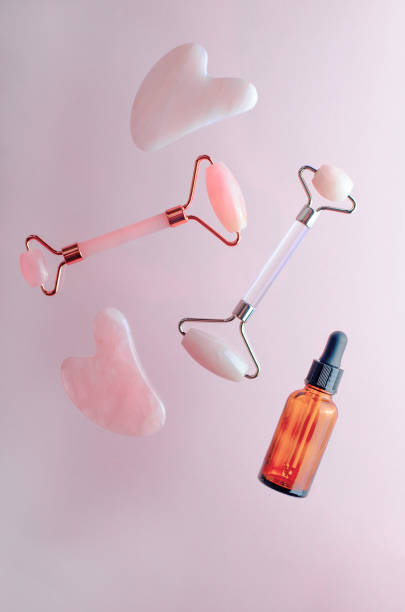 istock Rose Quartz Roller and Gua Sha Tool, Facial Lifting Massage Treatment 1496788076