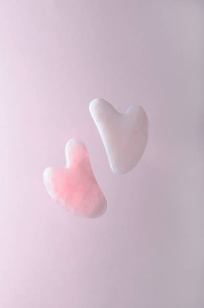 istock Rose Quartz Gua Sha tool, Facial Lifting Massage Treatment 1496788148