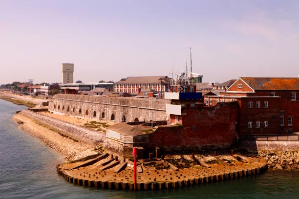 Aerial view of portsmouth historic dockyard, featuring hms warrior and modern naval vessels