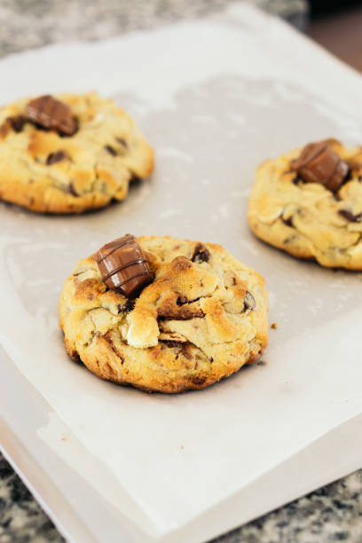 istock Stock image of three cookies with chocolate on top. 1496790807