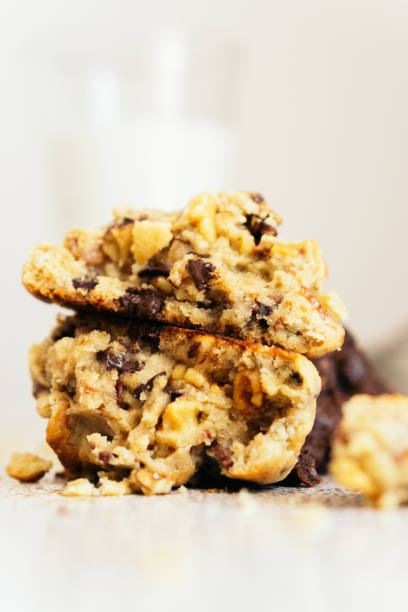 istock Detail shot of a delicious broken cookie with chocolate inside. 1496791654