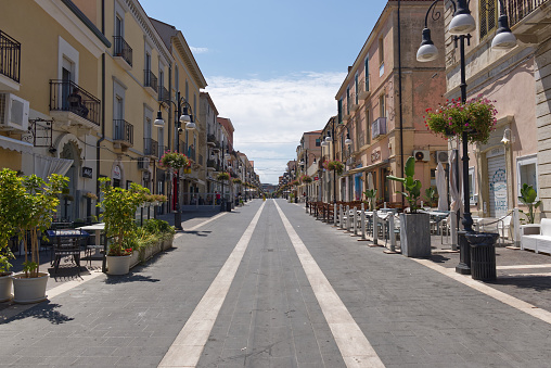 Termoli, Italy - Jul 7, 2022: Perspective view of viale dipendenza, the central pedestrian street of the city.