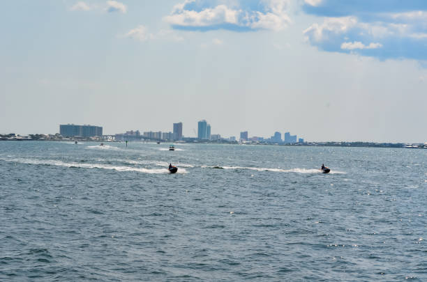 Summer Scenes, The Beach - Wave Runners in Bayou Saint John Memorial Day Weekend, Beginning of Summer, Orange Beach, Alabama alabama us state stock pictures, royalty-free photos & images