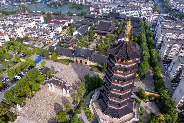 Aerial photography of temples and pagodas by the riverside in Fengcheng, Taizhou