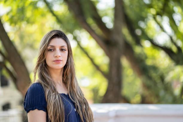 istock Thoughtful blond young woman with a lost look 1496807364