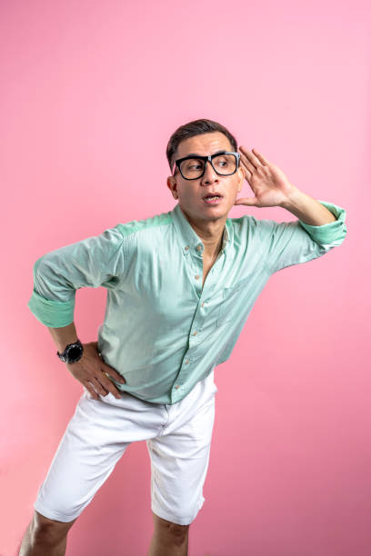 istock Man with eyeglasses and a shirt standing 1496807926
