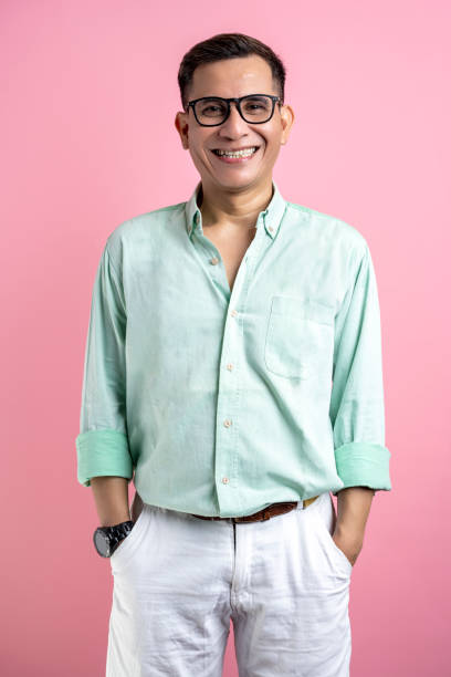 istock Man with eyeglasses and a shirt standing 1496807975