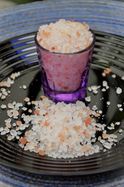 istock Small cup with pink Himalayan salt under the plate 1496810165