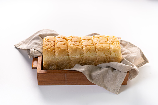 Fresh Baked brioche soft and fluffy bun white Bread or milk bread. isolated white background