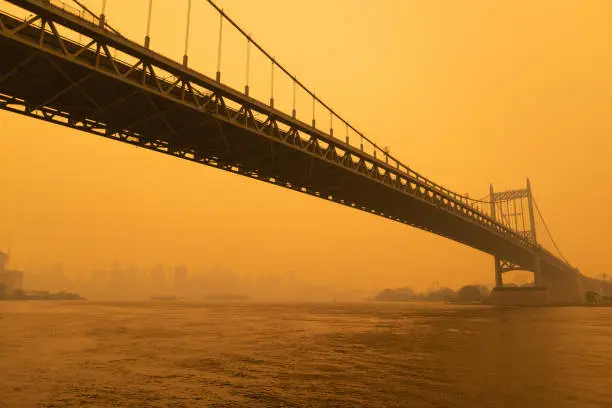 Photo of The Triborough Bridge along the East River in New York City with Massive Air Pollution from Wildfires
