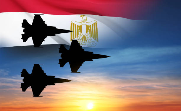 istock Silhouette of a military aircraft with Egypt flag against the sunset 1496827252