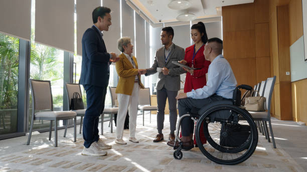 istock Asian diverse business individuals networking in a conference room 1496829778