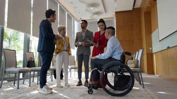 istock Asian diverse business individuals networking in a conference room 1496829780