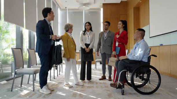 istock Asian diverse business individuals networking in a conference room 1496829785
