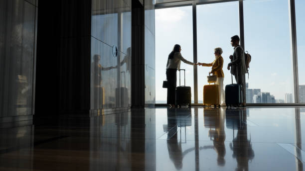 istock Asian business individual networking in hotel lobby 1496829811