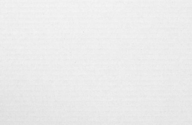 istock White cardboard sheet texture background, detail of recycle paper box pattern. 1496830395