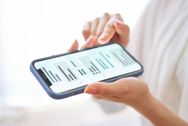 istock A woman's hand exchanging messages on a smartphone 1496834909