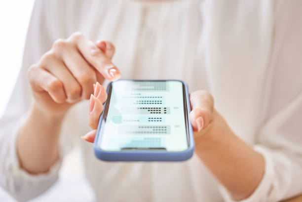 istock A woman's hand exchanging messages on a smartphone 1496834915