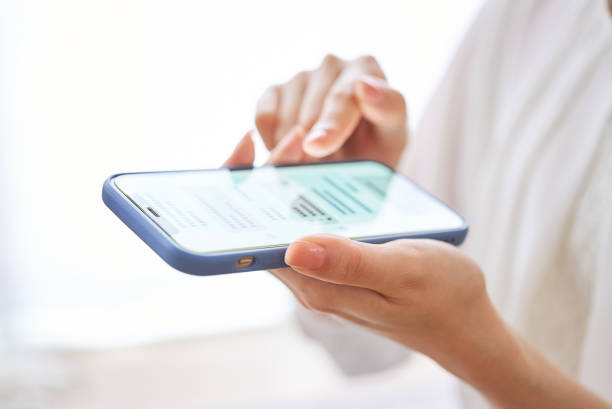 istock A woman's hand exchanging messages on a smartphone 1496834933