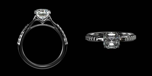 istock 3D render. Side view and top view of a platinum rings with diamonds surrounding the ring on isolated background. 1496839013