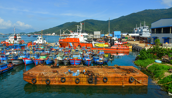 Da Nang, Vietnam - Jan 19, 2019. Wooden boats docking at Da Nang Pier (Vietnam). Da Nang is located on the coast of the South China Sea.