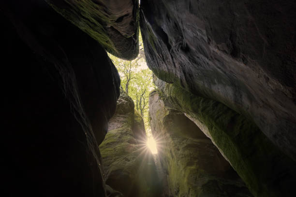 istock Sunbeams between natural stone columns in sandstone rocks 1496842722