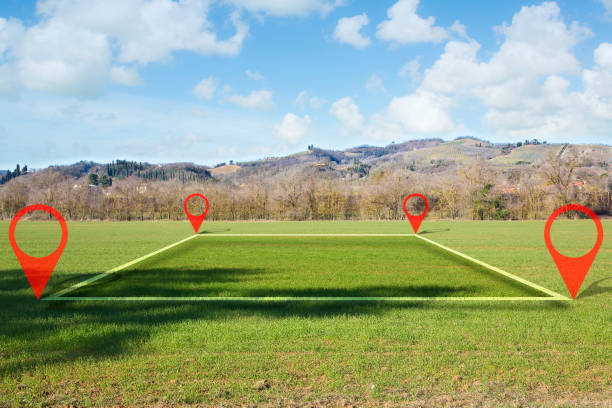 istock Land plot management - real estate concept with a vacant land on a green field available for building construction 1496843559