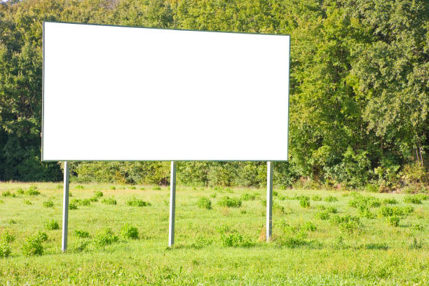 istock Blank advertising signboard in a countryside - concept with space for inserting text 1496844131