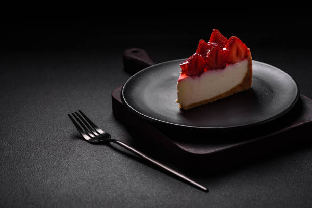 istock Delicious fresh cheesecake with strawberries, syrup and mascarpone cheese 1496848196