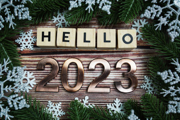 istock Hello 2023 Happy new year  holidays celebration with christmas decorations background 1496849744