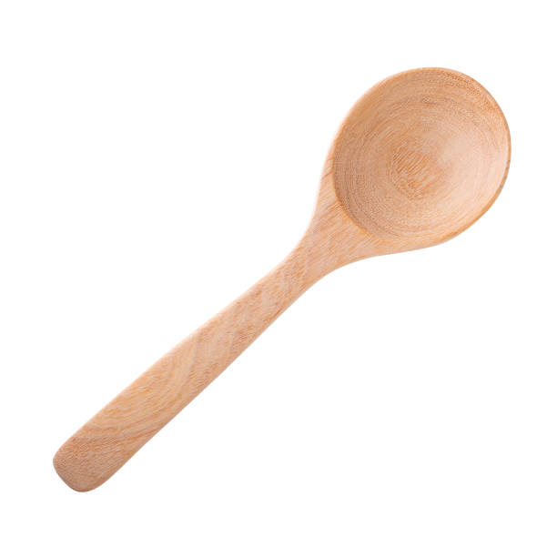istock wooden spoon isolated on a white background. 1496852963