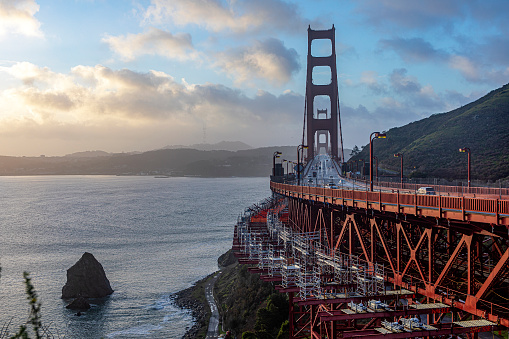 The fabulous Golden Gate Bridge as seen from a viewpoint on the side of the road across the bridge. The fabulous landmark of the Californian city of San Francisco. USA concept.