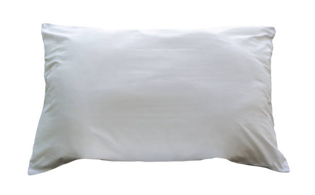 istock White pillow with case after guest's use at hotel or resort room isolated on white background with clipping path. Concept of confortable and happy sleep in daily life 1496856621