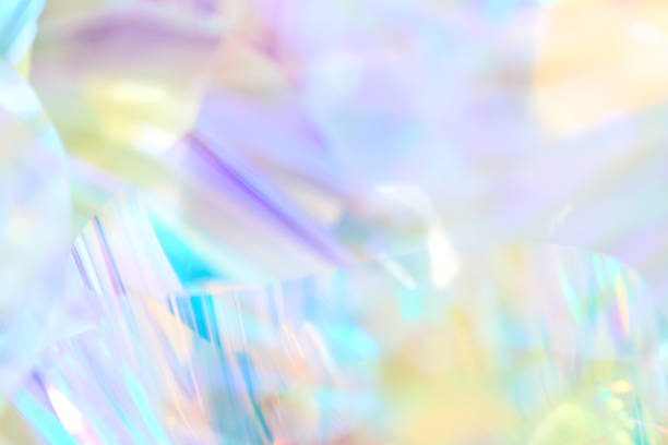 istock blurred pastel blue, purple, yellow holographic metallic foil background 1496856893