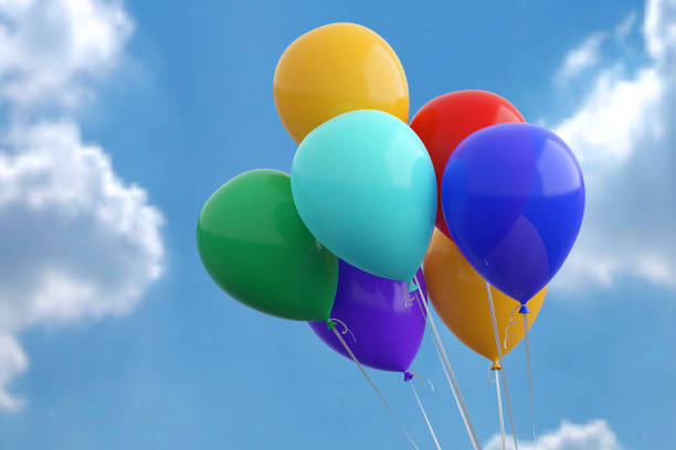 istock Colorful balloons flying over sky background 1496857269