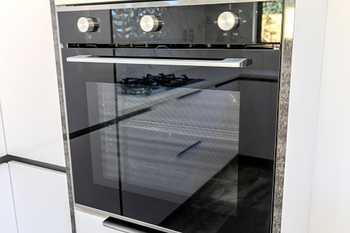 Modern oven at kitchen