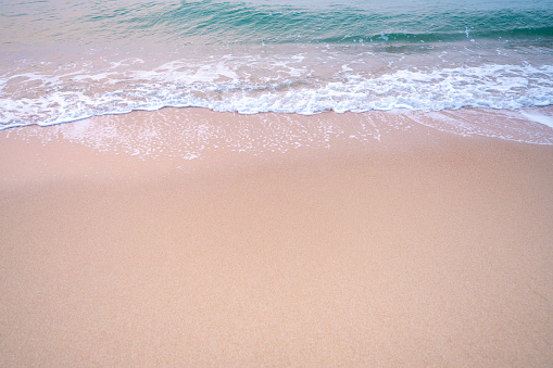 White foam and brown sand. at the sea of Thailand, Empty sea floor and beach with copy space