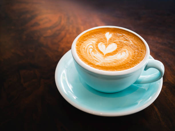 Coffee cup Latte art on wooden table Cafe menu
