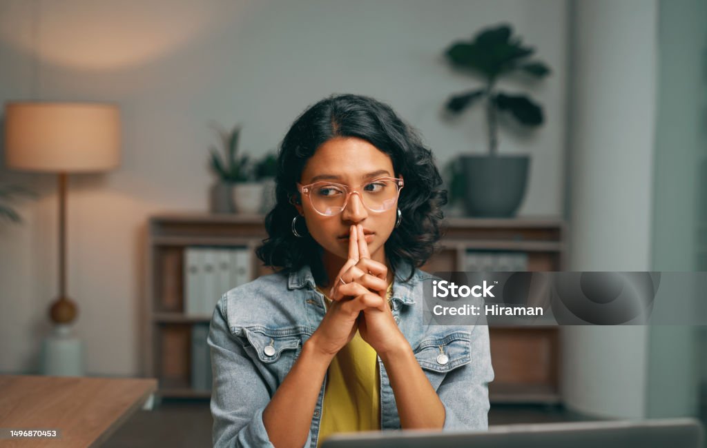 Student, stress and thinking in night home of university, college and school project fail, mistake and crisis. Anxiety, worry and fear for Indian woman with elearning technology, planning and problem Uncertainty Stock Photo